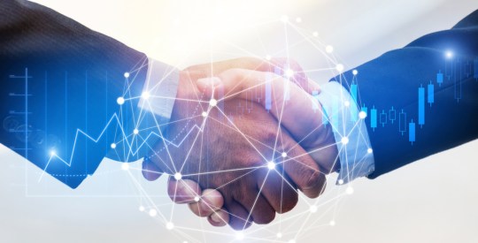 Deal. business man shaking hands with effect global network link connection and graph chart of stock market graphic diagram, digital technology, internet communication, teamwork, partnership concept